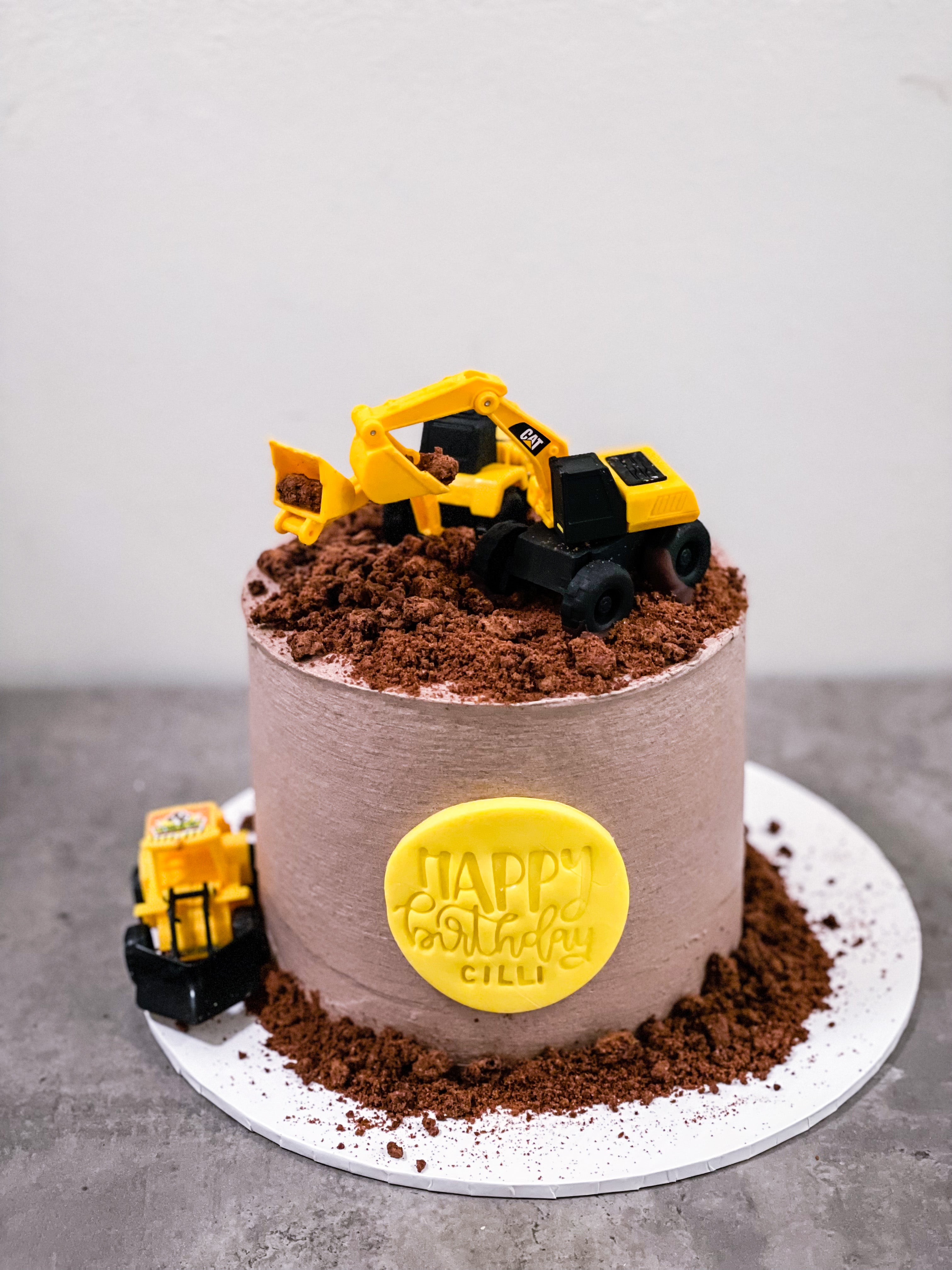 Construction Cake With Bulldozer Excavator And Dump Truck High-Res Stock  Photo - Getty Images
